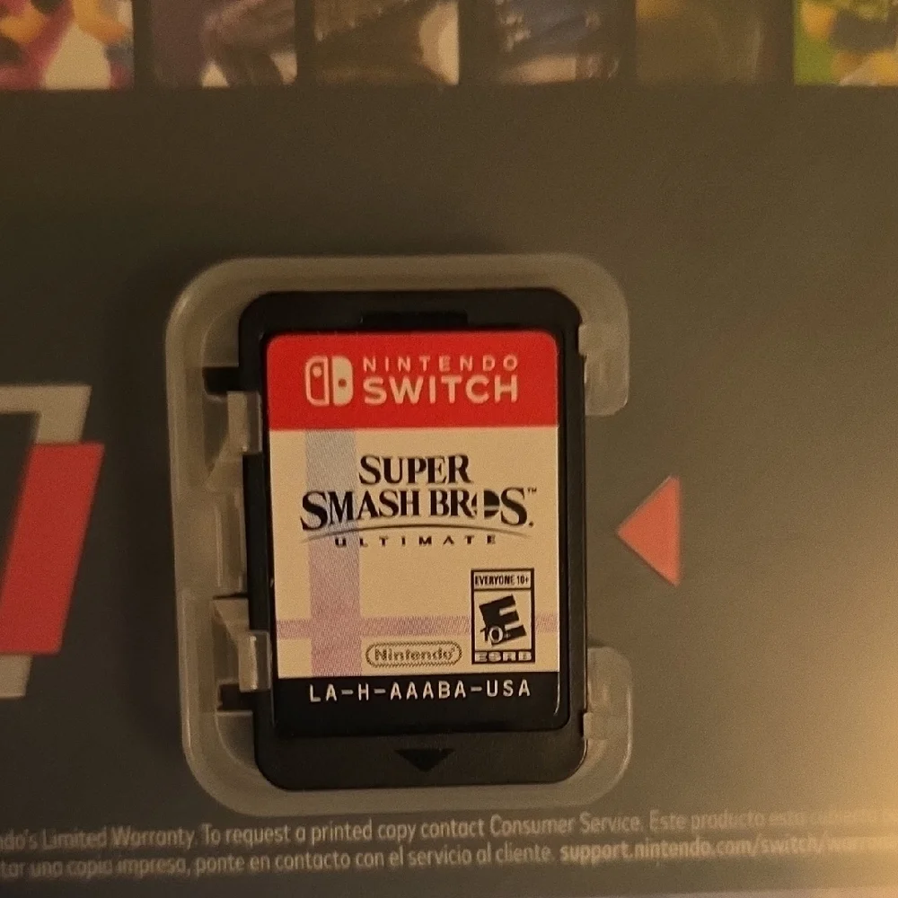 Nintendo Switch Console with Purple and Orange Joy-Con